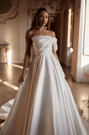 vestido de noiva princesa com maxi laço no ombro.