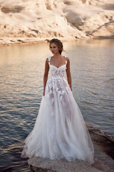 vestido de noiva com renda e transparência na saia 